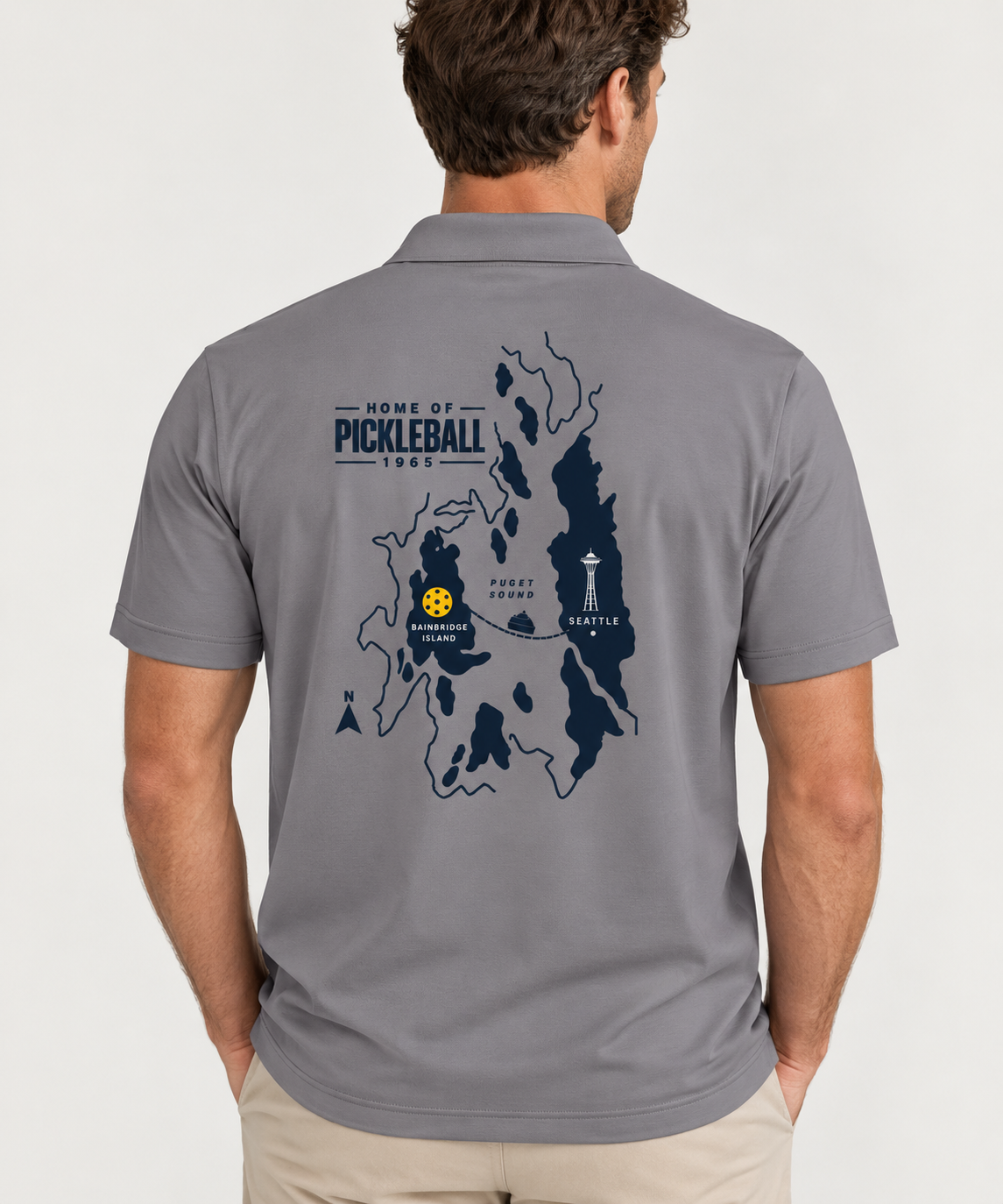 Bainbridge Island Home of Pickleball 1965 Men’s Performance Polo